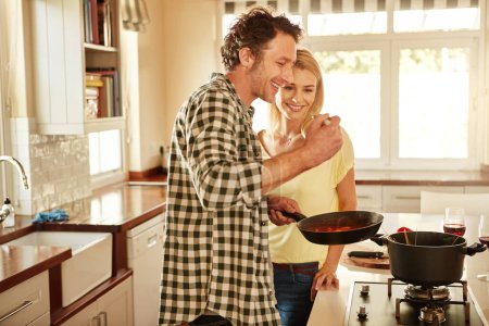 Photo for Taste, smile or happy couple kitchen cooking with healthy food for lunch or dinner together at home. Eating, love or woman laughing or smiling with mature husband in meal preparation in Australia. - Royalty Free Image