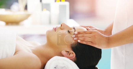 Photo for Woman, hands and relax in face massage at spa for zen, physical therapy or healthy wellness at resort. Calm female person relaxing or sleeping in luxury facial treatment or stress relief at salon. - Royalty Free Image