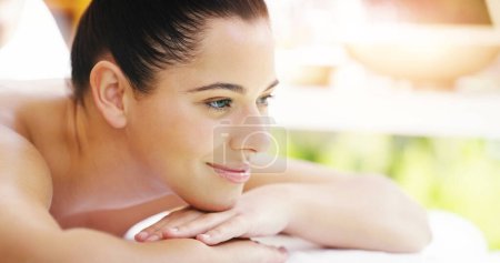 Photo for Happy woman, relax and smile in massage at spa for healthy wellness, zen or physical therapy treatment. Female person smiling and relaxing on table for self care, body or stress relief at the salon. - Royalty Free Image