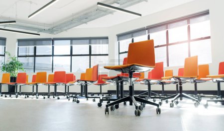 Photo for Take a seat, business is about to begin. chairs in an an empty modern office - Royalty Free Image