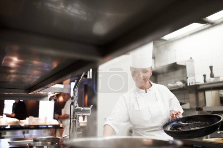 Photo for Passionate about cooking. the inner working of a professional kitchen - Royalty Free Image