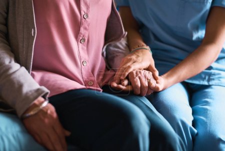 Photo for Im here to make things better. a nurse holding a senior womans hands in comfort - Royalty Free Image