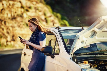 Photo for Breakdown on road trip, car and woman with phone to search for help, roadside assistance and auto insurance. Emergency, transport and lady with engine problem, smartphone and text for online service - Royalty Free Image