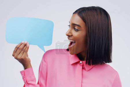 Photo for Woman is excited, speech bubble and social media with mockup space and online branding on white background. Communication, surprise announcement and female person with news and advertising in studio. - Royalty Free Image
