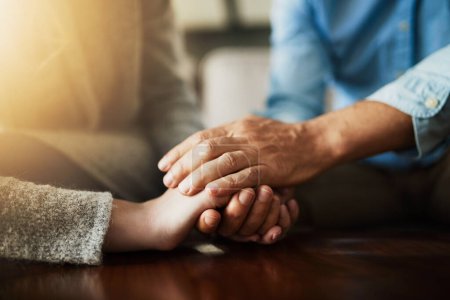 Photo for Holding hands, senior couple and life insurance support with kindness in a house. Home, love and elderly people with empathy, hope and trust with solidarity for grief care and marriage together. - Royalty Free Image