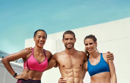 Photo for Smile, muscle and portrait of fitness team with blue sky at outdoor gym with fit body goals and friends summer. Workout, exercise and personal trainer man with women, happiness and healthy mindset - Royalty Free Image