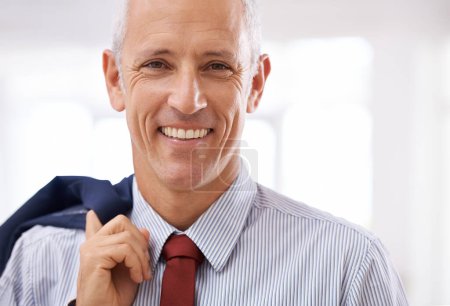 Photo for After all the hard work, I can finally relax. Portrait of a mature businessman holding his jacket over his shoulder - Royalty Free Image