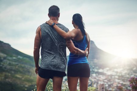 Photo for Getting fit with the most beautiful scenery. an unrecognizable couple training for a marathon outdoors - Royalty Free Image