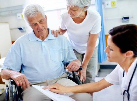 Photo for No really thats a good thing. a senior couple getting good news from their doctor - Royalty Free Image