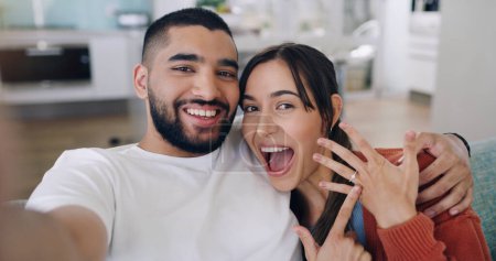 Photo for Couple, selfie and engagement ring in home portrait with happiness, romance and love on social media app. Man, woman and profile picture for marriage proposal, offer or celebration with smile on blog. - Royalty Free Image