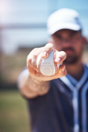 Photo for Hand holding baseball, closeup and man for sports, field and training with blurred background in sunshine. Softball player, sport and zoom of ball for training, fitness and workout for competition. - Royalty Free Image