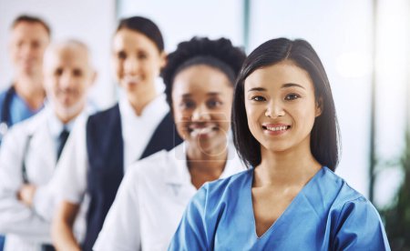 Photo for Team, happy woman leader and portrait of doctors and nurses in hospital, teamwork and healthcare. Health, diversity and medicine, confident doctor and group of medical employees in row with smile - Royalty Free Image
