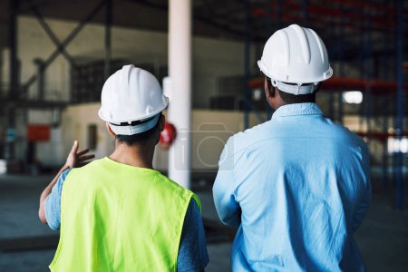 Photo for What the client wants, the client gets. two builders inspecting a construction site - Royalty Free Image