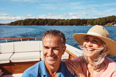 Photo for Its a vacation to remember. a mature couple enjoying a relaxing boat ride - Royalty Free Image