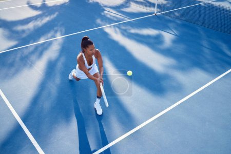 Photo for Tennis is a psychological sport. an attractive young woman playing tennis outside - Royalty Free Image