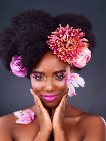Photo for Makeup, flowers and art with portrait of black woman in studio for beauty, creative or spring. Natural, cosmetics and floral with model isolated on gray background for color, self love or confidence. - Royalty Free Image