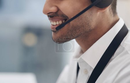 Photo for Headset, mouth and man consultant in a call center for customer service closeup while talking on a call. Smile, support and contact us with a happy male employee consulting in a telemarketing office. - Royalty Free Image