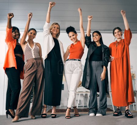 Photo for Fist, power and business women standing together. for success, winning and gender equality or fight for human rights. Portrait, teamwork and group of people with empowerment, yes hands or celebration. - Royalty Free Image