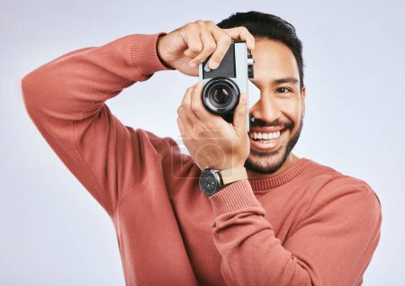 Photo for Man with camera, photography and smile in portrait with creativity and art isolated on studio background. Happy male photographer, creative with artistic person and taking pictures with gadget. - Royalty Free Image