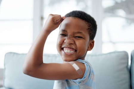Photo for African boy kid, vaccine and portrait with smile, medicine and flex muscle for wellness in hospital. Male child, strong and excited with plaster for injection, healthcare and injection to stop virus. - Royalty Free Image