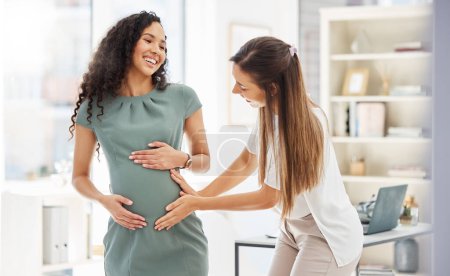 Photo for Happy, woman visit her pregnant friend and in a office of their modern workplace with a lens flare. Baby care or healthcare wellness, happiness and friends together at workstation with stomach growth. - Royalty Free Image