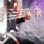 Guitar, smoke and man hands at music festival show playing rock with electric instrument with mockup. Sound, musician and party with live talent and audio for punk event with people at a concert.