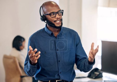Photo for Call center, talking and black man with headset for customer service, crm or telemarketing support. African person, consultant or agent talk on microphone for sales, contact us or help desk advice. - Royalty Free Image