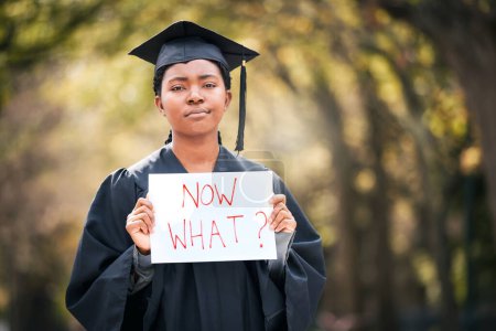 Photo for Portrait, graduation or poster with a black woman in doubt as a student at a university event. Confused, question and a female college graduate standing on campus asking what now after scholarship. - Royalty Free Image