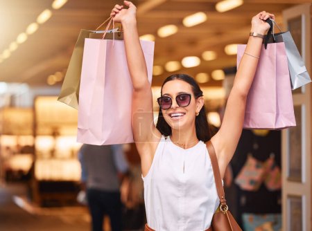 Photo for Excited, sale and happy woman with a shopping bag in mall for fashion, giveaway or discount. Portrait of rich customer person celebrate win with retail bags for product promotion, commerce and offer. - Royalty Free Image