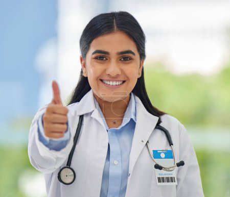 Photo for Woman, doctor portrait and thumbs up with hospital success, motivation and yes in clinic. Emoji, winner and like hand sign of a professional healthcare and wellness worker feeling happy from job. - Royalty Free Image