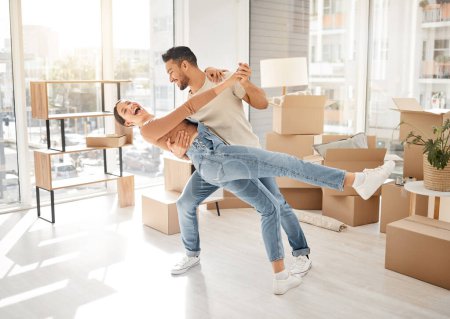Photo for Celebration, dance and couple with boxes, property and excited with rent apartment, mortgage and home. Cardboard, man and woman dancing, real estate and moving with love, quality time and romance. - Royalty Free Image