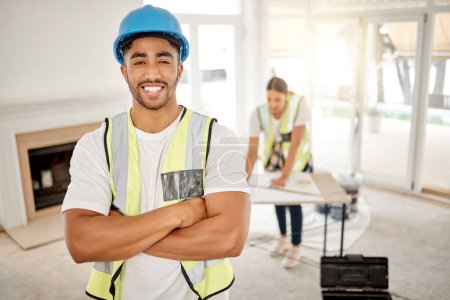 Photo for Portrait of man, construction and home renovation with arms crossed, helmet and smile in apartment. Yes, positive mindset and renovations, happy handyman in safety and building project in new house - Royalty Free Image