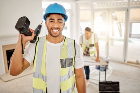 Photo for Portrait of man, construction and home renovation with drill, helmet and working mindset in apartment. Yes, smile and diy renovations, happy handyman in safety and building project tools in new house. - Royalty Free Image