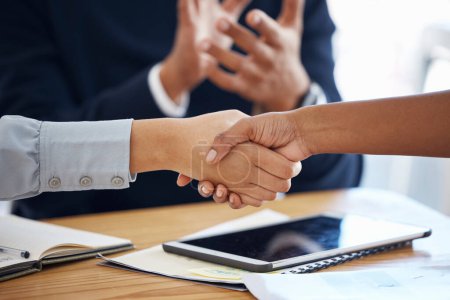 Photo for Thank you, colleagues shaking hands and in a business meeting in a modern office together. Partnership or collaboration, congratulations or agreement and coworkers with handshake for teamwork. - Royalty Free Image