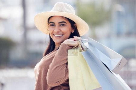 Photo for Woman in portrait, smile with shopping bag and retail at outdoor mall, luxury purchase and shop discount. Happy female customer, fashion designer brand and buyer choice with store promotion and sale. - Royalty Free Image