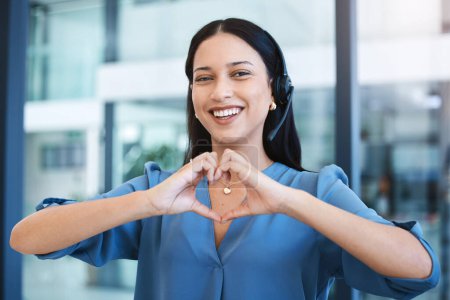 Photo for Happy woman, call center and portrait with heart hands in customer service, support or telemarketing at office. Female person consultant agent with smile or loving emoji in online advice at workplace. - Royalty Free Image