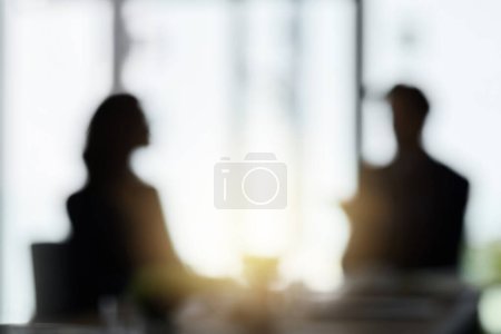 Photo for Silhouette, blur and business people in meeting in office for discussion, planning and conversation. Corporate workplace, collaboration and blurred man and woman in conference room for partnership. - Royalty Free Image