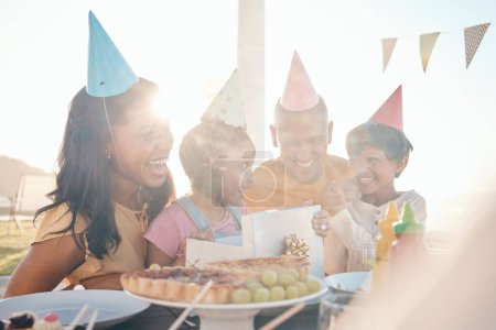 Photo for Family, love and happy birthday for girl with wow gift, bonding and laughing, excited and having fun outdoors. Parents, children and kid party outside for cheerful female child with surprise present. - Royalty Free Image