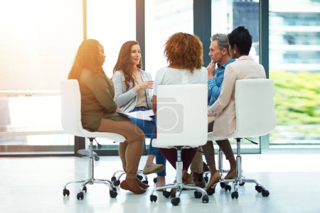 Photo for The team with the best collaborative skills. a team of colleagues having a meeting in a modern office - Royalty Free Image