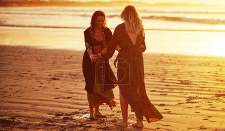 Photo for Most people just exist, we live. young people together on the beach - Royalty Free Image