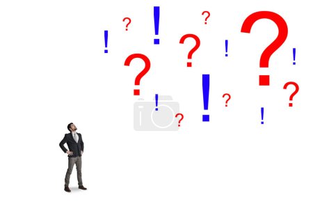 Photo for First understand it, then invest in it. a businessman looking up at question marks against a white background - Royalty Free Image