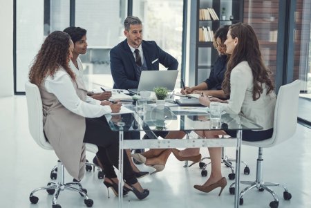 Photo for Strategizing with success as the goal. a group of colleagues having a meeting in a modern office - Royalty Free Image