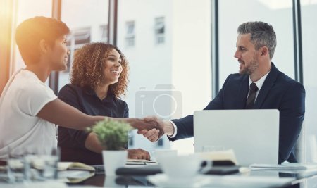 Photo for I couldnt have asked for better employees. a group of businesspeople having a meeting in the boardroom - Royalty Free Image