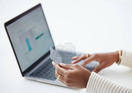 Photo for Woman, hands and laptop with credit card for ecommerce, payment or finance on website mockup. Hand of female person or shopper on computer for banking app, purchase or online shopping at workplace. - Royalty Free Image