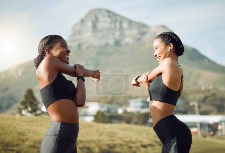 Photo for Fitness friends outdoor, women stretching arms for workout with happiness and active lifestyle in park. Exercise in nature, healthy and happy with female people training and warm up together. - Royalty Free Image