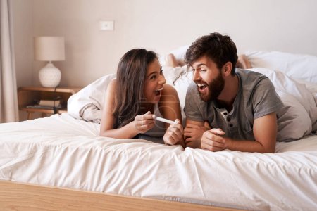 Photo for Pregnancy test, home bedroom or happy couple excited for pregnant announcement, notification or surprise. Baby result, love bond and morning man, woman or relax people shocked with family news in bed. - Royalty Free Image