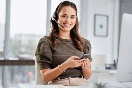 Photo for Call center, portrait or happy woman typing on smartphone on break with smile in customer services. Telecom, relaxing or friendly telemarketing consultant in communication on social media mobile app. - Royalty Free Image