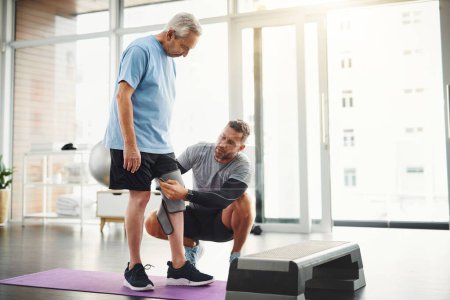 Photo for Lets get your body back to functioning 100. a young male physiotherapist assisting a senior patient in recovery - Royalty Free Image