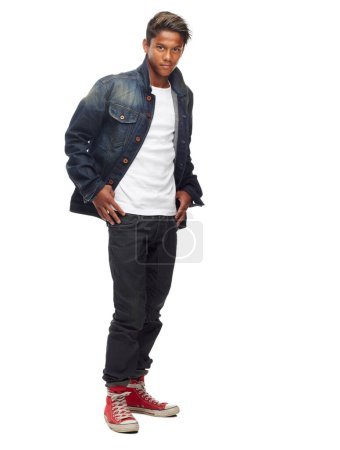 Photo for Fashion, serious and portrait of man on a white background with confidence, attitude and pride in studio. Model, confident and isolated young male person with trendy clothes, style and denim jacket. - Royalty Free Image