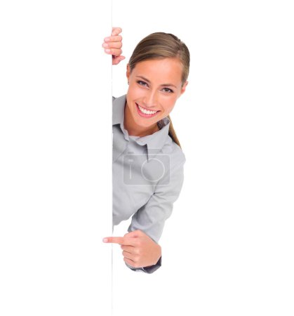 Photo for Pointing, portrait and a woman with a poster for business isolated on a white background in a studio. Mockup, happy and a brand ambassador with blank signage space for advertising and marketing. - Royalty Free Image